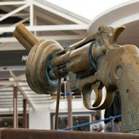 What part of this Great Deception do you not understand? The-sculpture-of-the-Knotted-Gun-at-the-V-A-Waterfront-Cape-Town-Photo-by-Kirsten-Watkins-300x300