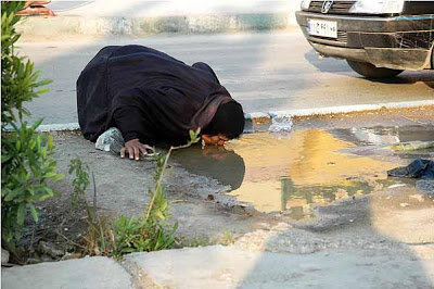 حركة 20 فبراير تدعو للتظاهر  يوم الاحد 24 أبريل  Iran_poverty_woman_Khoramshahr