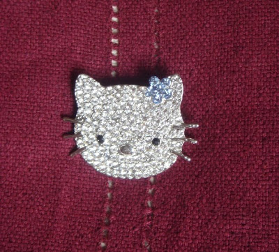 اكسسورات هلو كتي ...................... رووووووووووووعه Broche%20hello%20kitty