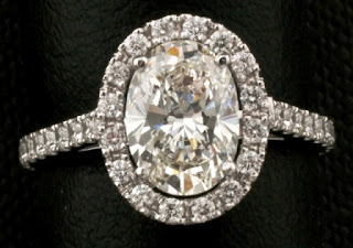 شكيلة مجوهرات روووووعة   1_carat_oval_diamond_ring