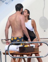 Nina Dobrev and Asustin Stowell enjoy the ocean off the cost the French Riviera (July 26) LY5zdW4b