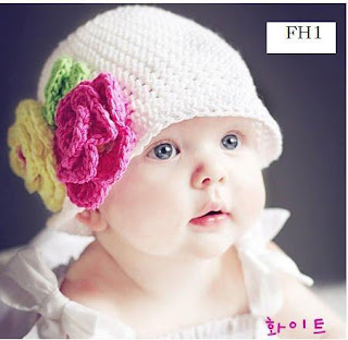 طريقة سهلة لكروشيه ورود  1279332553_105593597_1-Pictures-of--CROCHET-FLOWER-HAT-1279332553