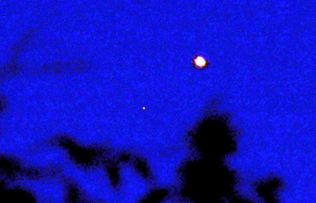  Red-Orange Orb comes through spiral vortex in the sky above Sioux Falls, South Dakota Ufo%2Borb%2Bspiral%2Bvortex%2Bwormhole