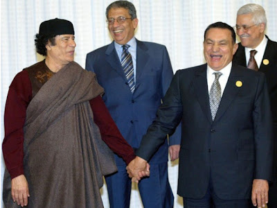 ادخلو وهتتأكدو انه اشيك رجل بالعالم Muammar_algaddafi_07