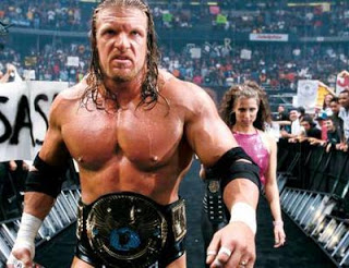 صور نجوم راو HHH-and-Stephanie-triple-h-and-stephanie-mcmahon-4430835-400-308