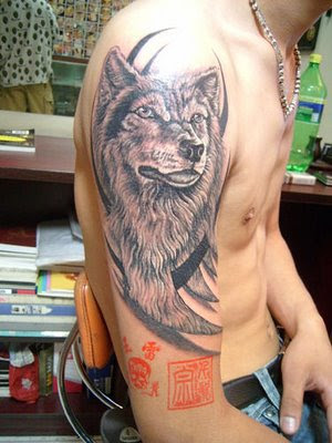 tattoos!! A%20wolf%20tattoo%20on%20the%20arm