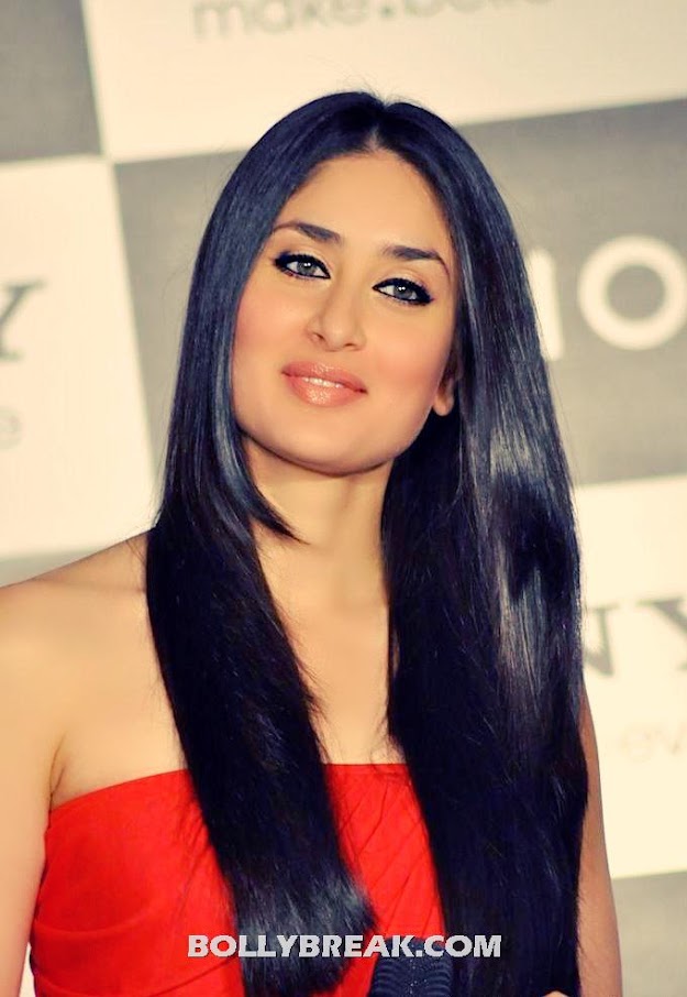 كارينا كابور وتالقهااااااا باللون الاحمر الجذااااااااااب على زى افلااااام Kareena-kapoor-in-red-shoulderless-dress-long-black-hair