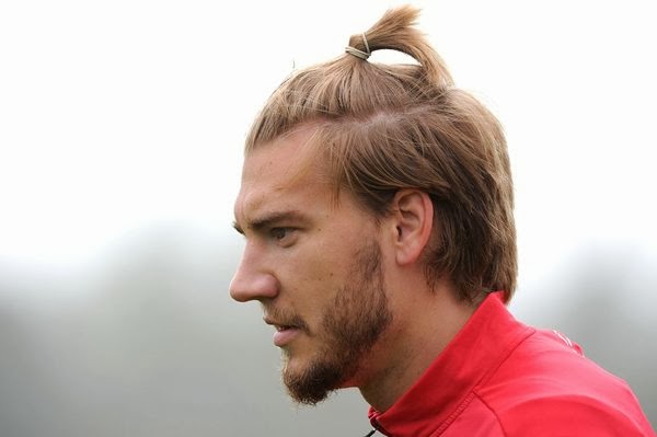 Top Football Moments in 2013 BendtnerNick-Zlatan-main