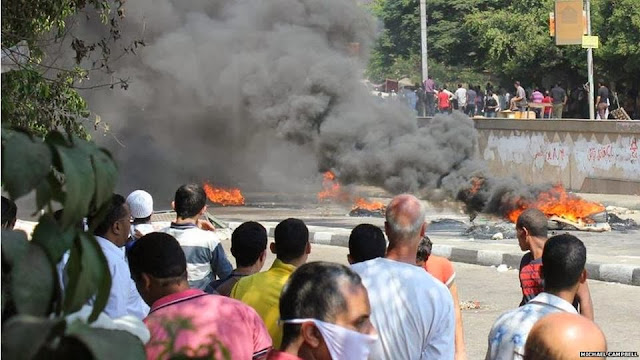 صور تُنشر لأول مرة لأحداث ميدان الجيزة ونفق الهرم أثناء مذبحة الفض 1459725_10202609934430001_512315391_n