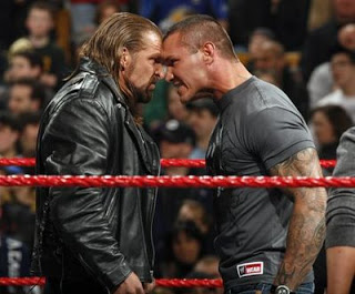 تريبل اتش يعلق على إيقاف راندي أورتن  WWE-Superstars-Triple-H-and-Randy-Orton
