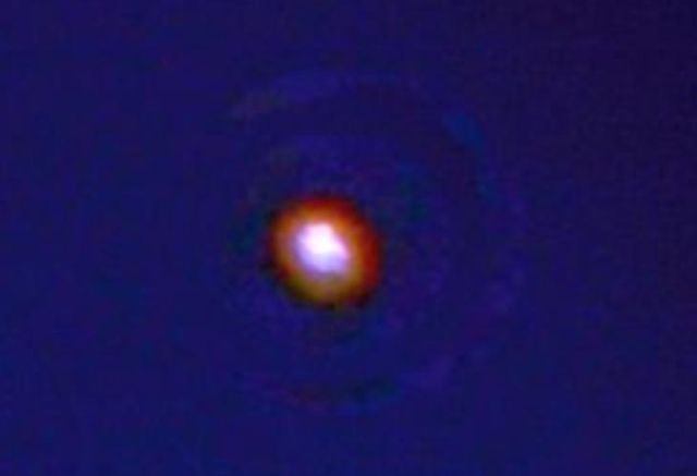  Red-Orange Orb comes through spiral vortex in the sky above Sioux Falls, South Dakota Ufo%2Borb%2Bspiral%2Bvortex%2Bwormhole%2B%25283%2529