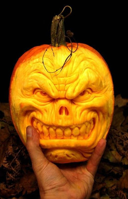 பூசணியில் செதுக்கப்பட்ட வியக்கத்தக்க உருவங்கள்  Pumpkin-carvings-08