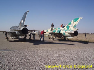 بالصورماذا فعلت وتفعل قوات الاحتلال الغاشمة بطائرات القوة الجوية العراقي IqAF-MiG-21-05