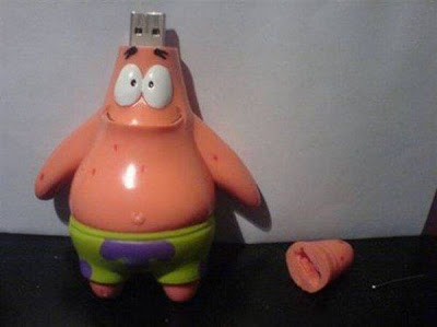 யு எஸ் பி (பென்ரைவ்) விதமான படங்கள். - Page 3 Funny-usb-flash-drives-08