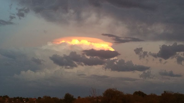 Orange Object in sky behind brilliant white cloud above Phoenix, Arizona  Strange%2Bcloud%2Barizona