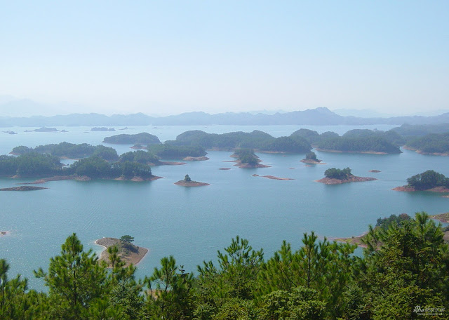بحيرة عذبة تضم أكثر من 400 جزيرة ساحرة في شرق الصين 0_86795_31fba563_orig