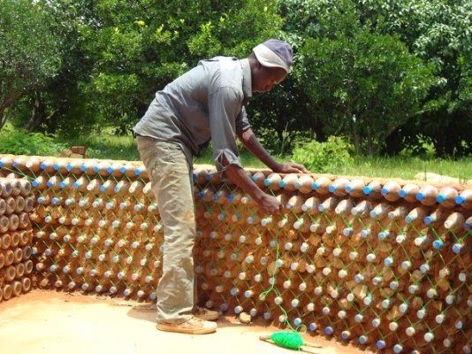 Thread of cheap self made houses... Plastic-bottle-house-4