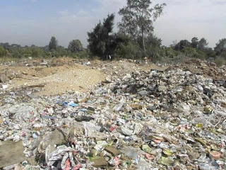 Garbage dumping and archaeological looting in Abu Sir alarm  Garbage