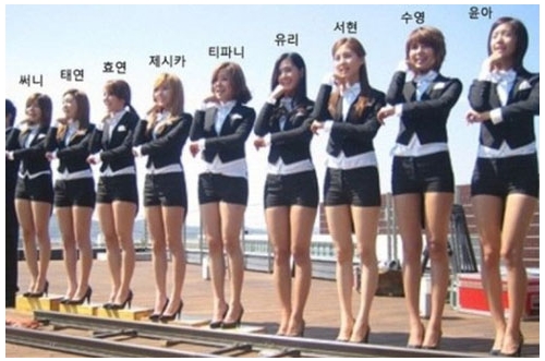 ماذا فعلن بعض اعضاء SNSD ليبدون في نفس طول العضوات الاخرين ؟؟ 20120315_girlsgeneration_height