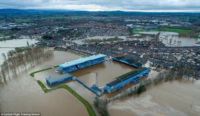 Flooding Norway - UK Battered with Storms 2F1D88FF00000578-3348001-Carlisle_United_Football_Club_s_stadium_Brunton_Park_remains_und-a-9_1449464024631