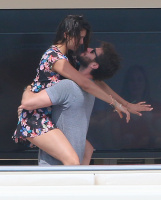 Nina Dobrev and Asustin Stowell enjoy the ocean off the cost the French Riviera (July 26) F9LYzPG7