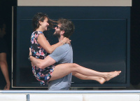 Nina Dobrev and Asustin Stowell enjoy the ocean off the cost the French Riviera (July 26) Yywhgyr9