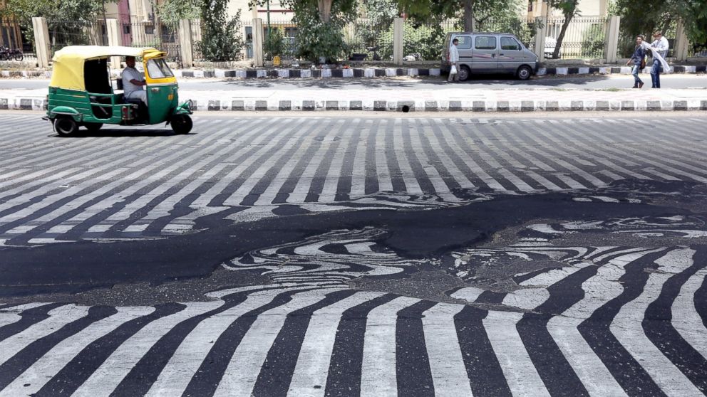 India’s heat wave death toll tops 1,826 – hospitals overwhelmed – delirium reported in mass, no end in sight EPA_india_heat_wave_6_sk_150527_16x9_992