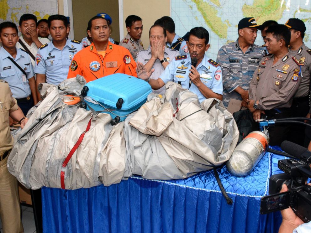 AirAsia Crash: Leading Theories About What Caused Plane to Go Down Ap_airasia_luggage_debris_4_wy_141230_4x3_992