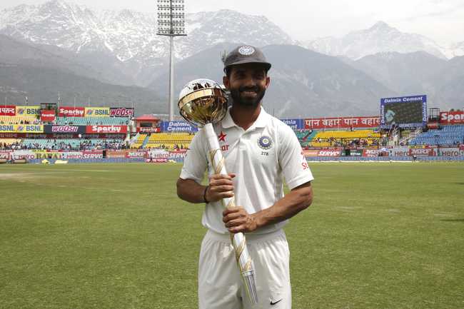 India end up the Home Season with sealing the Test Series 2-1 against Australia. Rahane-poses-with-the-mace-giv