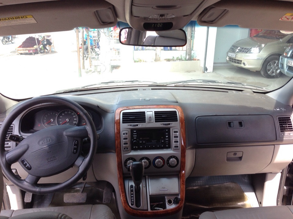 Bán xe Kia Carnival AT 2009, màu đen, 365 triệu 1457164438_ce5b1a3a