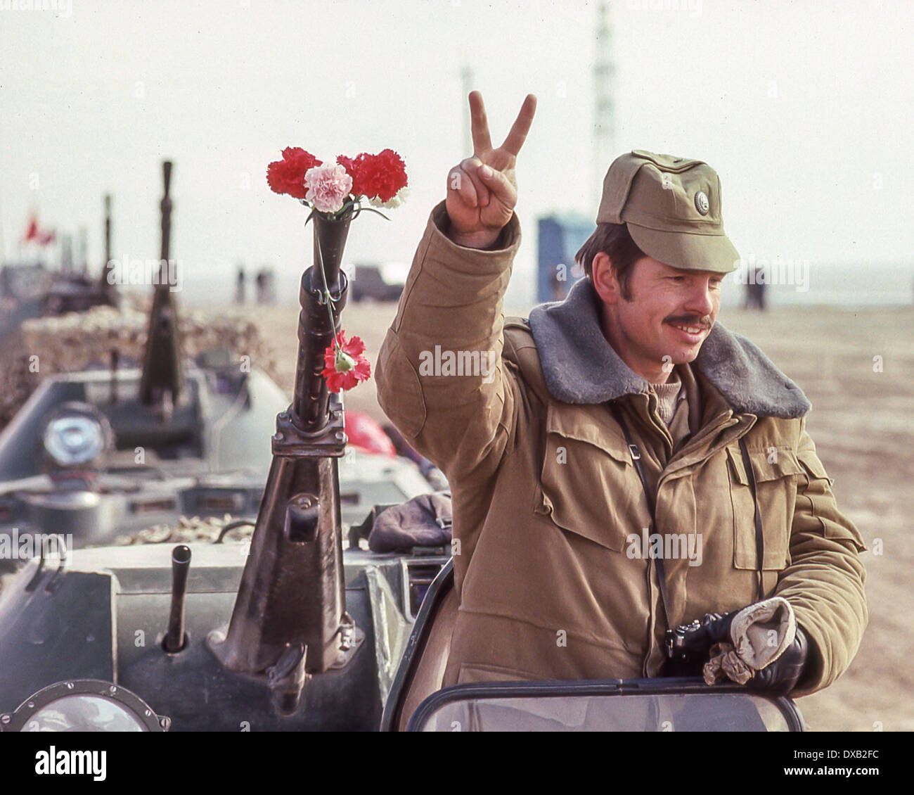 Soviet Afghanistan war - Page 6 Feb-16-1989-termez-uzbekistan-ru-standing-atop-a-soviet-armored-personnel-DXB2FC