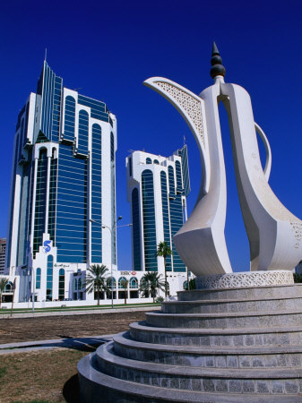 கத்தார் அழகுக்காட்சி... Daffey-mark-twin-towers-and-teapot-sculpture-at-eastern-end-of-the-corniche-doha-ad-dawhah-qatar