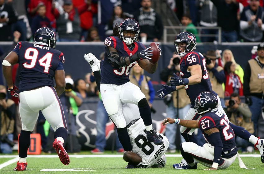 Almost with ease, home teams advance in wild card weekend 9794542-latavius-murray-jadeveon-clowney-nfl-afc-wild-card-oakland-raiders-houston-texans-850x560