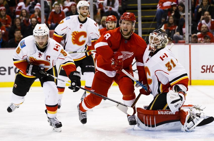 Red Wings' struggles continue against Calgary, 3-2 9008856-justin-abdelkader-mark-giordano-karri-ramo-nhl-calgary-flames-detroit-red-wings-850x560