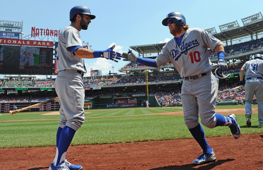 Blue Jays & Indians go up 2-0; Dodgers & Cubs win Game 1 9394726-justin-turner-chris-taylor-mlb-los-angeles-dodgers-washington-nationals