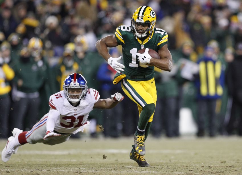 Almost with ease, home teams advance in wild card weekend 9798168-randall-cobb-trevin-wade-nfl-nfc-wild-card-new-york-giants-green-bay-packers