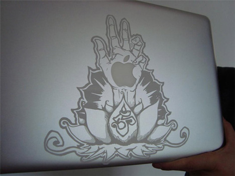 Apple Appeal: 15 Amazing Examples of Macbook Case Art Lotus-hand-macbook-engraved-art