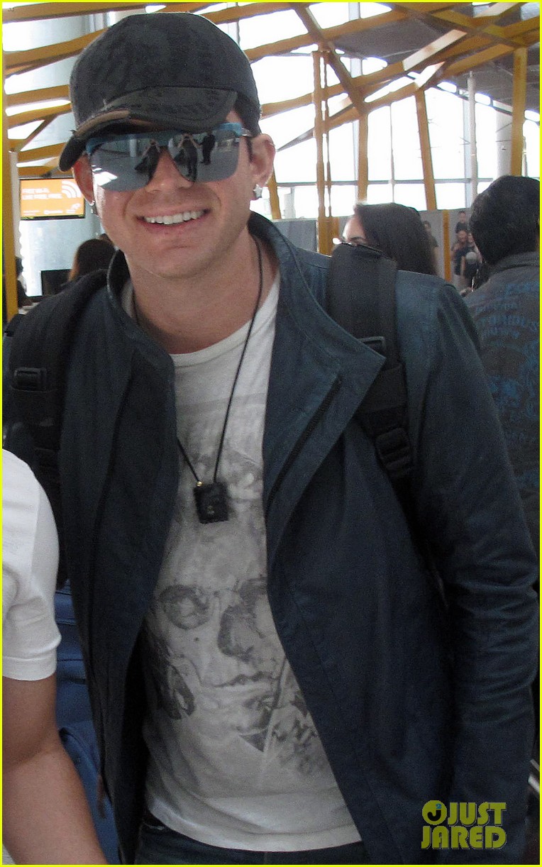 Adam Lambert at Pearson International Airport on Monday (May 28) Adam-lambert-trespassing-toronto-04