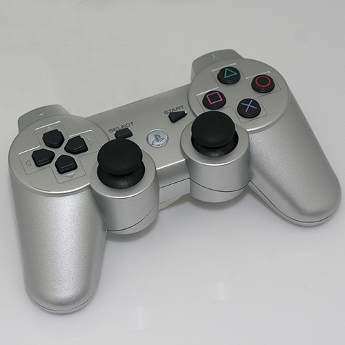 Ftes de fin d'anne - Page 2 600mAh_Rechargeable_Wireless_Dual-Shock_Game_Controller_for_PS3_Silver_1