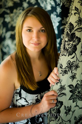 Greenwood High School...~Pick 'n' Play~ Senior-Portraits--pretty-girl-posing-by-abstract-background