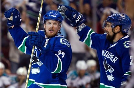 Canucks tear into Sharks, 7-3 to take 2-0 series lead Ap-201105182120768255239