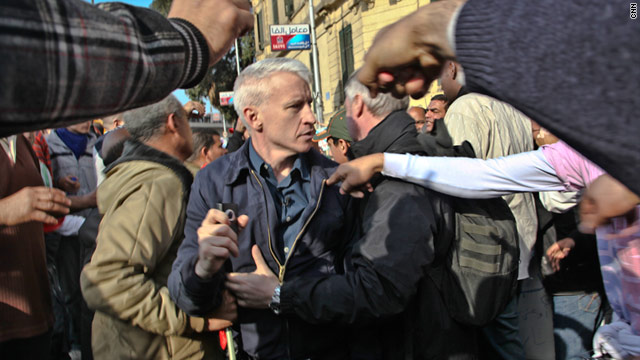 Pro-Mubarak demonstrators attack journalists T1larg.anderson.cooper.cnn