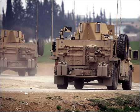 U.S. deploys Marines to Syria to provide artillery support to Kurdish forces US-forces-armoured-vehicles-near-Syrian-city-of-Manbij-March-3-2017-afp