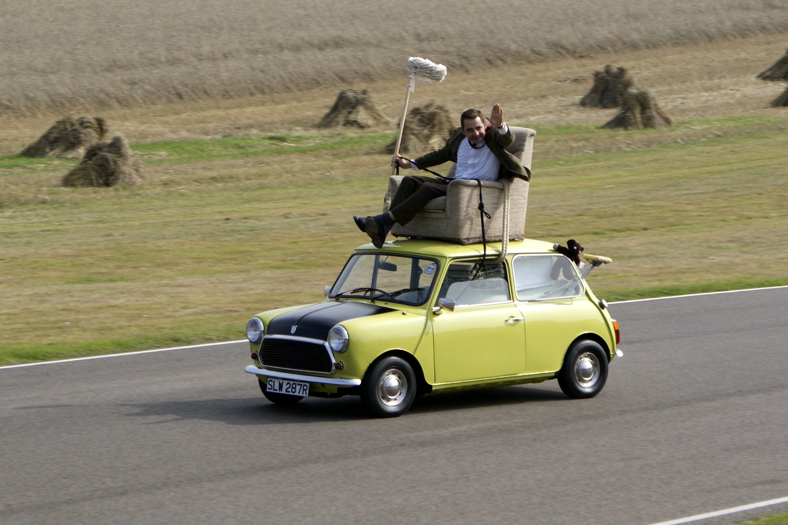 United States AI Solar System (1) - Page 20 Rowan_Atkinson_on_a_Mini_at_Goodwood_Circuit_in_2009