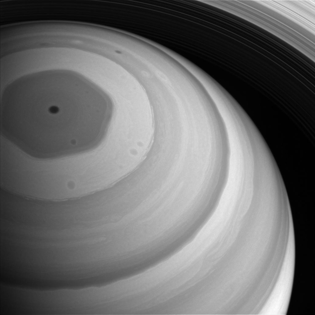Saturn’s famous hexagon towers above cloudtops Saturn-hexagon-greyscale
