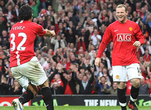      56_g_Tevez-Rooney_500x365