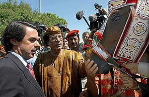 Al Qaradawi declara una fatua para matar a Gadafi 1195618855_0