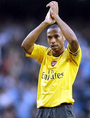 صور روعة للاعيبة عالميين ( زيدان و كاكا و هنرى و .....) Arsenal-henry-afp