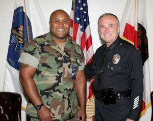 MASSIVE MANHUNT in Los Angeles for Ex-LAPD officer Christopher Dorner/ Was reported that his body was found in a flaming cabin/  Christopher Dorner's body positively ID'd/Died of Self-Inflicted Gunshot to his Head. 20130206_114735_dorner-bratton_300