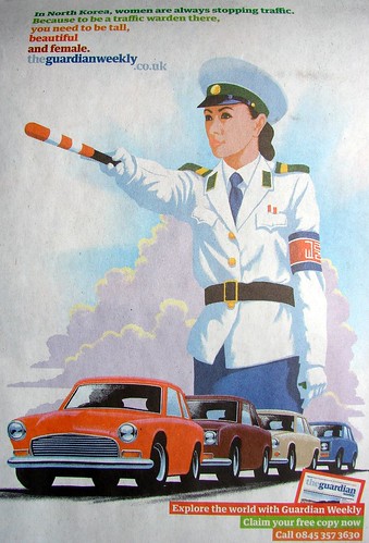 Pyongyang Traffic Warden in UK news advertisment poster 2508415148_a6617a6a18